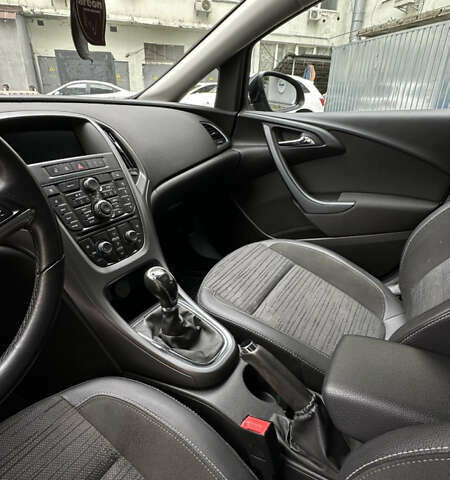 Черный Опель Астра, объемом двигателя 1.2 л и пробегом 235 тыс. км за 6500 $, фото 13 на Automoto.ua