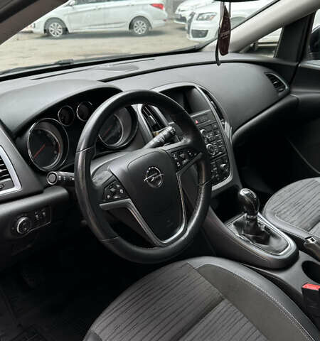 Черный Опель Астра, объемом двигателя 1.2 л и пробегом 235 тыс. км за 6500 $, фото 12 на Automoto.ua