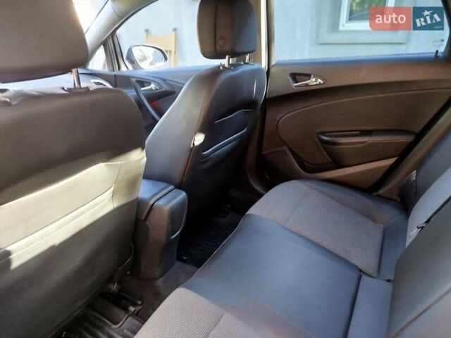 Черный Опель Астра, объемом двигателя 1.6 л и пробегом 237 тыс. км за 9700 $, фото 15 на Automoto.ua