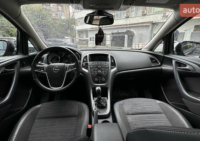 Черный Опель Астра, объемом двигателя 1.2 л и пробегом 235 тыс. км за 6500 $, фото 24 на Automoto.ua