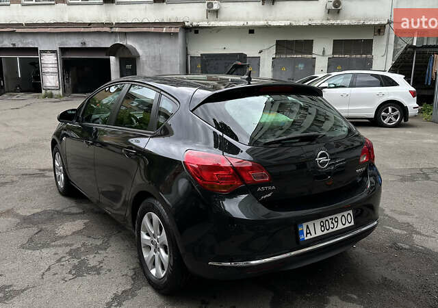Черный Опель Астра, объемом двигателя 1.2 л и пробегом 235 тыс. км за 6500 $, фото 5 на Automoto.ua