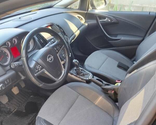 Черный Опель Астра, объемом двигателя 1.6 л и пробегом 237 тыс. км за 9700 $, фото 2 на Automoto.ua