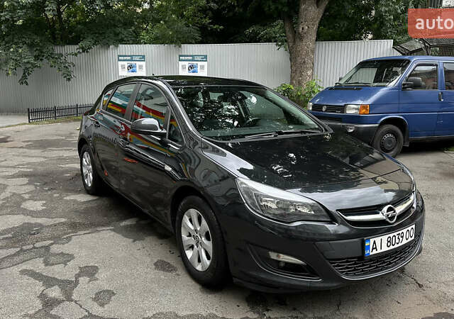 Черный Опель Астра, объемом двигателя 1.2 л и пробегом 235 тыс. км за 6500 $, фото 1 на Automoto.ua