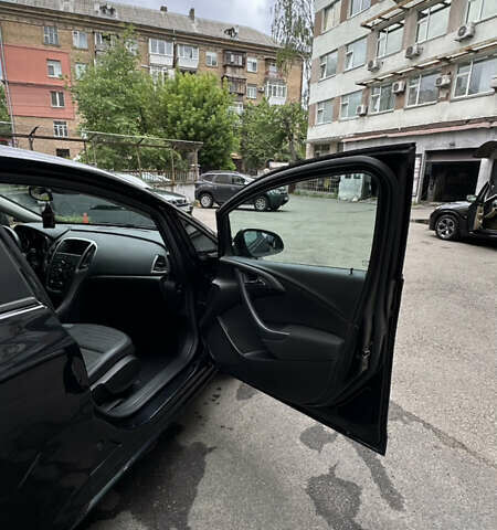 Черный Опель Астра, объемом двигателя 1.2 л и пробегом 235 тыс. км за 6500 $, фото 8 на Automoto.ua