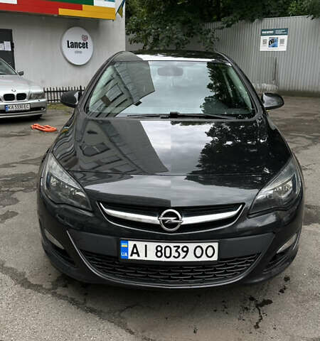 Черный Опель Астра, объемом двигателя 1.2 л и пробегом 235 тыс. км за 6500 $, фото 2 на Automoto.ua