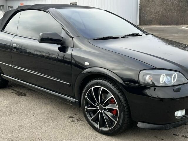 Черный Опель Астра, объемом двигателя 2.2 л и пробегом 200 тыс. км за 4600 $, фото 3 на Automoto.ua