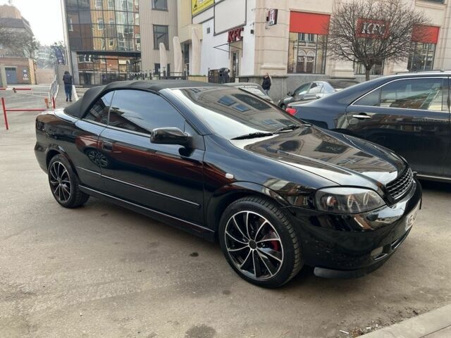 Черный Опель Астра, объемом двигателя 2.2 л и пробегом 200 тыс. км за 4600 $, фото 1 на Automoto.ua