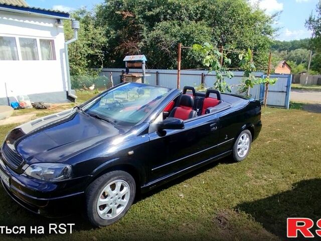 Черный Опель Астра, объемом двигателя 1.8 л и пробегом 200 тыс. км за 4000 $, фото 8 на Automoto.ua