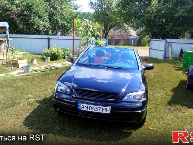 Черный Опель Астра, объемом двигателя 1.8 л и пробегом 200 тыс. км за 4000 $, фото 1 на Automoto.ua