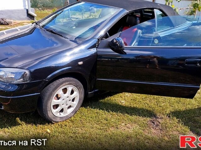 Черный Опель Астра, объемом двигателя 1.8 л и пробегом 200 тыс. км за 4000 $, фото 12 на Automoto.ua