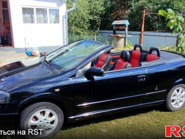 Черный Опель Астра, объемом двигателя 1.8 л и пробегом 200 тыс. км за 4000 $, фото 4 на Automoto.ua