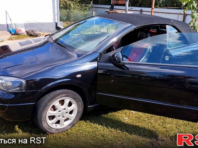 Черный Опель Астра, объемом двигателя 1.8 л и пробегом 200 тыс. км за 4000 $, фото 11 на Automoto.ua