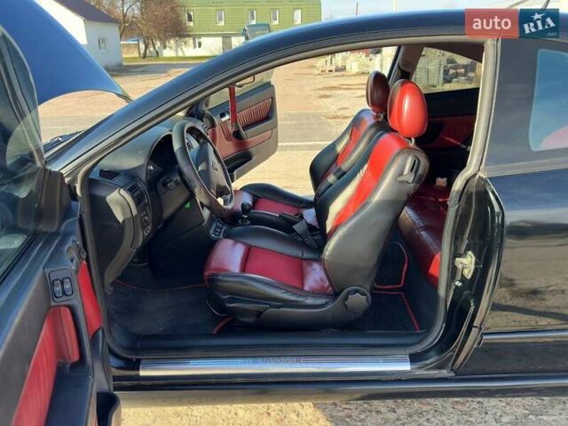 Черный Опель Астра, объемом двигателя 2.2 л и пробегом 297 тыс. км за 3700 $, фото 3 на Automoto.ua