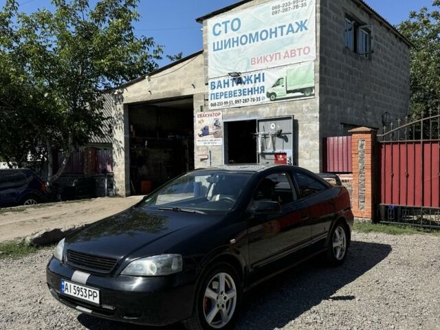 Черный Опель Астра, объемом двигателя 1.8 л и пробегом 286 тыс. км за 3300 $, фото 1 на Automoto.ua