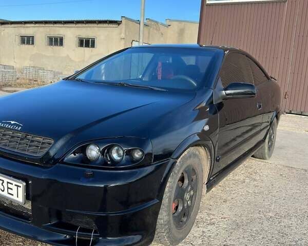 Черный Опель Астра, объемом двигателя 2.2 л и пробегом 297 тыс. км за 3700 $, фото 11 на Automoto.ua