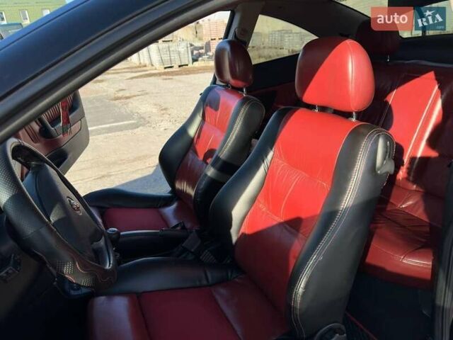 Черный Опель Астра, объемом двигателя 2.2 л и пробегом 297 тыс. км за 3700 $, фото 4 на Automoto.ua