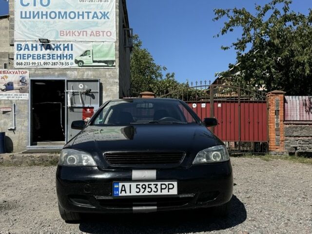 Черный Опель Астра, объемом двигателя 1.8 л и пробегом 286 тыс. км за 3300 $, фото 2 на Automoto.ua