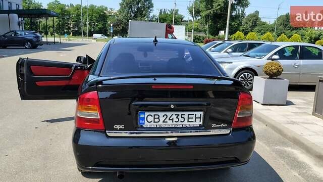 Черный Опель Астра, объемом двигателя 2 л и пробегом 155 тыс. км за 8400 $, фото 3 на Automoto.ua