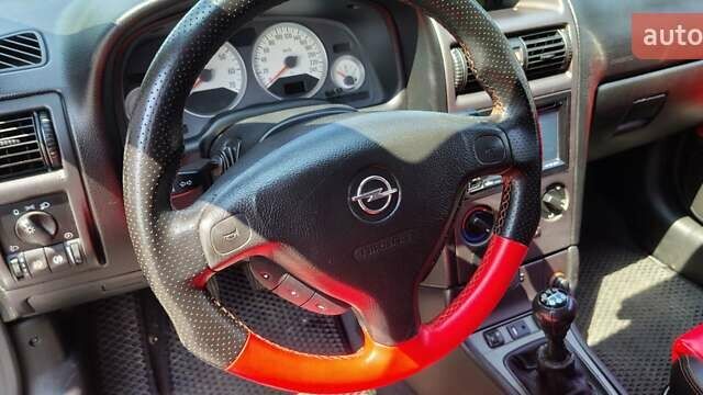 Черный Опель Астра, объемом двигателя 2 л и пробегом 155 тыс. км за 8400 $, фото 5 на Automoto.ua