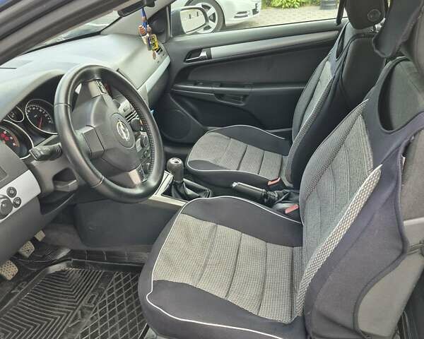 Черный Опель Астра, объемом двигателя 1.6 л и пробегом 237 тыс. км за 4500 $, фото 11 на Automoto.ua