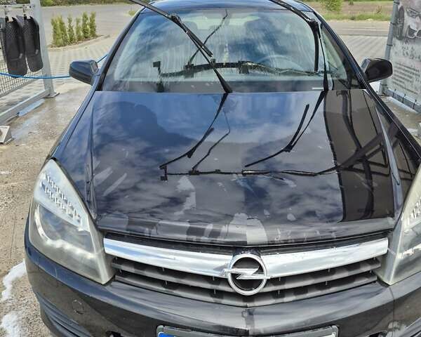 Черный Опель Астра, объемом двигателя 1.6 л и пробегом 237 тыс. км за 4500 $, фото 4 на Automoto.ua
