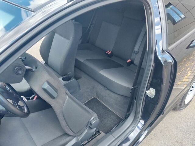 Черный Опель Астра, объемом двигателя 1.4 л и пробегом 185 тыс. км за 5350 $, фото 7 на Automoto.ua