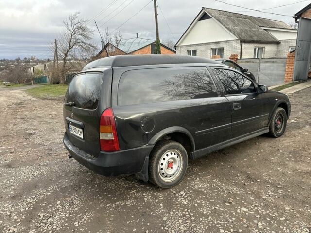 Черный Опель Астра, объемом двигателя 1.7 л и пробегом 200 тыс. км за 1200 $, фото 2 на Automoto.ua