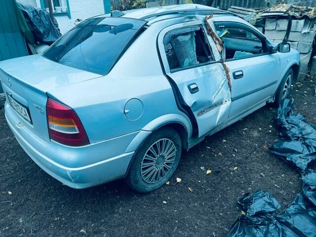 Черный Опель Астра, объемом двигателя 2 л и пробегом 300 тыс. км за 1300 $, фото 1 на Automoto.ua