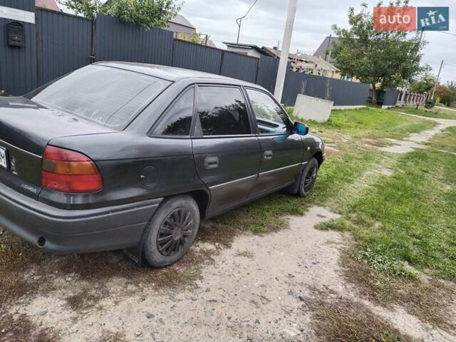 Черный Опель Астра, объемом двигателя 1.4 л и пробегом 270 тыс. км за 1750 $, фото 7 на Automoto.ua