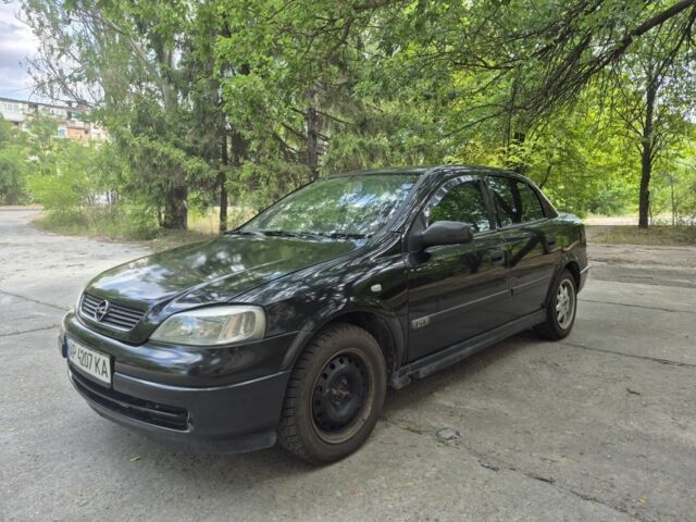 Черный Опель Астра, объемом двигателя 1.6 л и пробегом 202 тыс. км за 2200 $, фото 6 на Automoto.ua