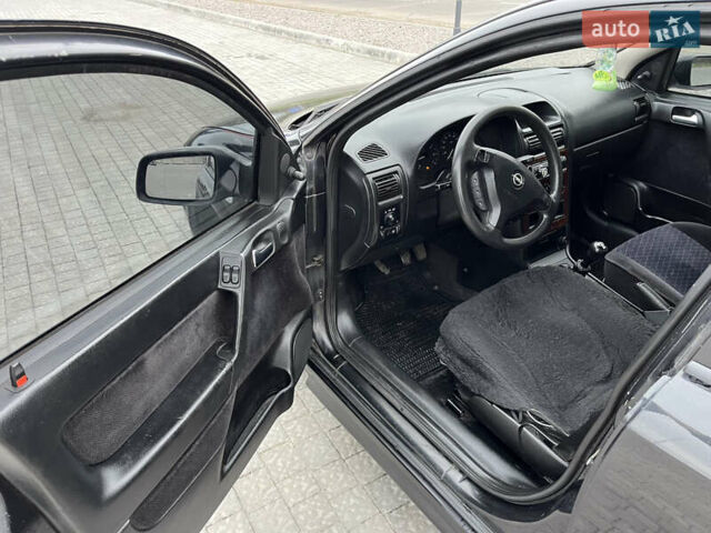 Черный Опель Астра, объемом двигателя 1.6 л и пробегом 205 тыс. км за 1999 $, фото 8 на Automoto.ua