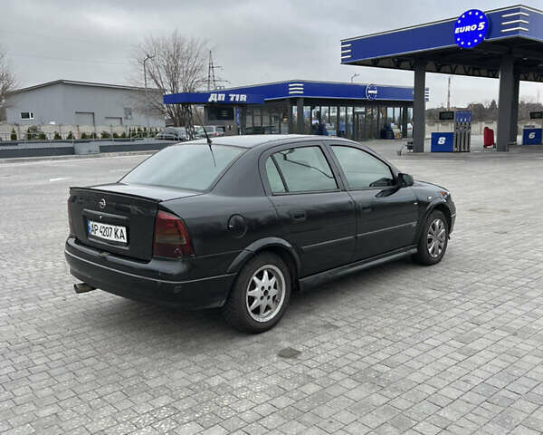 Черный Опель Астра, объемом двигателя 1.6 л и пробегом 205 тыс. км за 1999 $, фото 4 на Automoto.ua