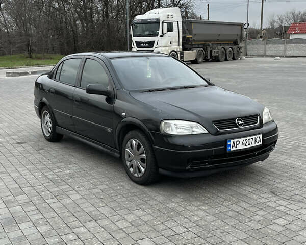 Черный Опель Астра, объемом двигателя 1.6 л и пробегом 205 тыс. км за 1999 $, фото 6 на Automoto.ua