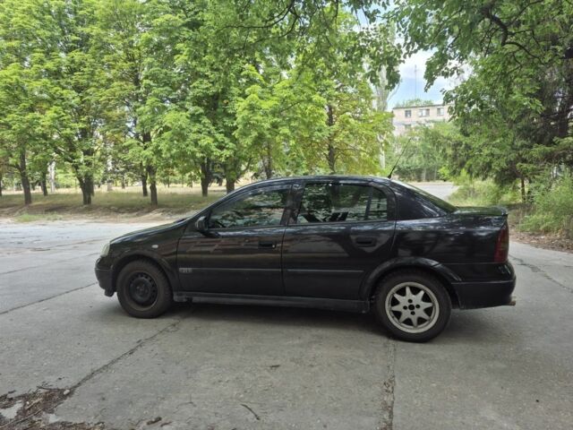 Черный Опель Астра, объемом двигателя 1.6 л и пробегом 202 тыс. км за 2200 $, фото 7 на Automoto.ua