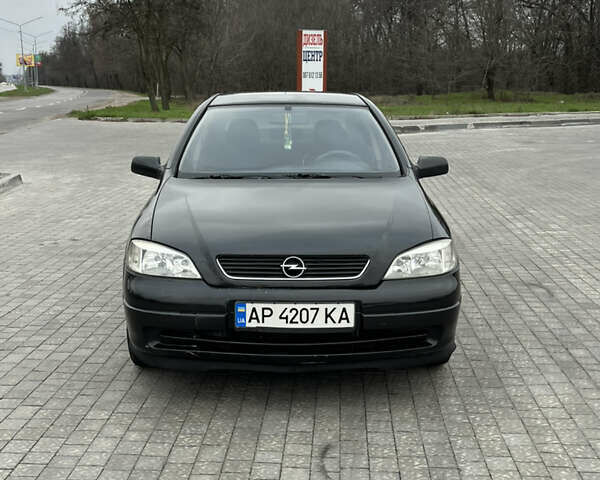 Черный Опель Астра, объемом двигателя 1.6 л и пробегом 205 тыс. км за 1999 $, фото 7 на Automoto.ua
