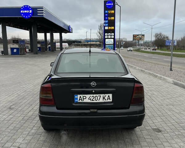 Черный Опель Астра, объемом двигателя 1.6 л и пробегом 205 тыс. км за 1999 $, фото 3 на Automoto.ua