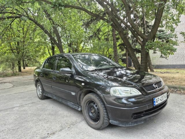 Черный Опель Астра, объемом двигателя 1.6 л и пробегом 202 тыс. км за 2200 $, фото 1 на Automoto.ua