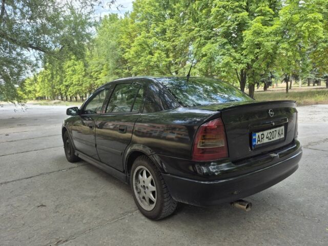 Черный Опель Астра, объемом двигателя 1.6 л и пробегом 202 тыс. км за 2200 $, фото 5 на Automoto.ua