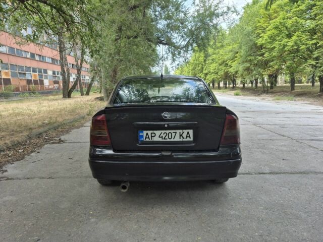 Черный Опель Астра, объемом двигателя 1.6 л и пробегом 202 тыс. км за 2200 $, фото 3 на Automoto.ua