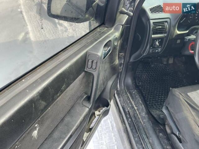 Черный Опель Астра, объемом двигателя 1.6 л и пробегом 300 тыс. км за 1650 $, фото 3 на Automoto.ua