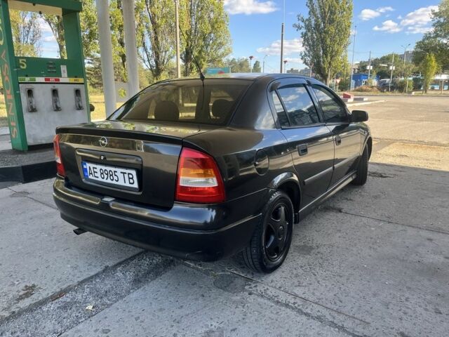 Черный Опель Астра, объемом двигателя 1.6 л и пробегом 251 тыс. км за 3500 $, фото 1 на Automoto.ua