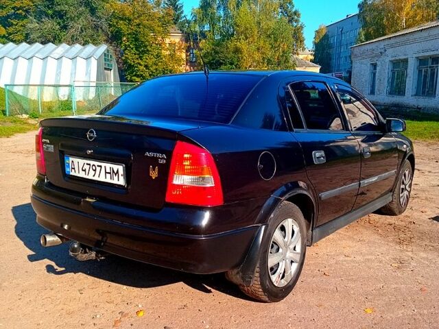 Черный Опель Астра, объемом двигателя 1.6 л и пробегом 327 тыс. км за 3500 $, фото 1 на Automoto.ua