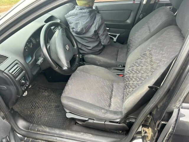 Черный Опель Астра, объемом двигателя 1.6 л и пробегом 290 тыс. км за 3000 $, фото 3 на Automoto.ua