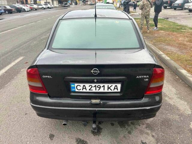 Черный Опель Астра, объемом двигателя 1.6 л и пробегом 290 тыс. км за 3000 $, фото 1 на Automoto.ua