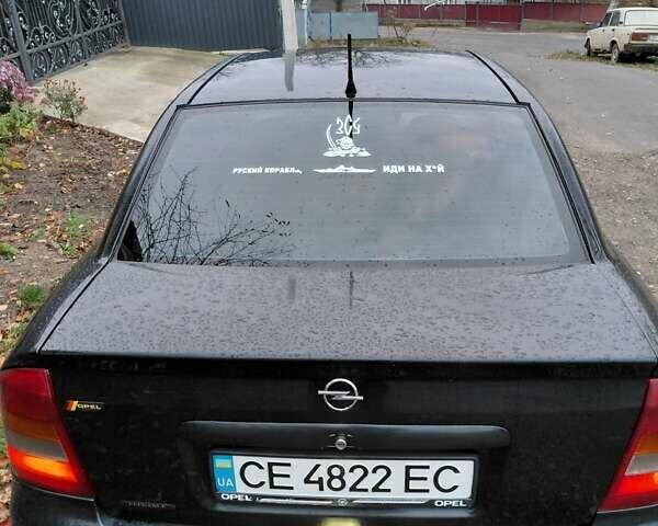 Черный Опель Астра, объемом двигателя 2 л и пробегом 350 тыс. км за 3199 $, фото 13 на Automoto.ua