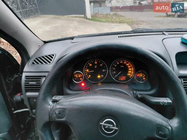 Черный Опель Астра, объемом двигателя 2 л и пробегом 350 тыс. км за 3199 $, фото 7 на Automoto.ua
