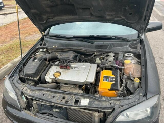 Черный Опель Астра, объемом двигателя 1.6 л и пробегом 290 тыс. км за 3000 $, фото 4 на Automoto.ua