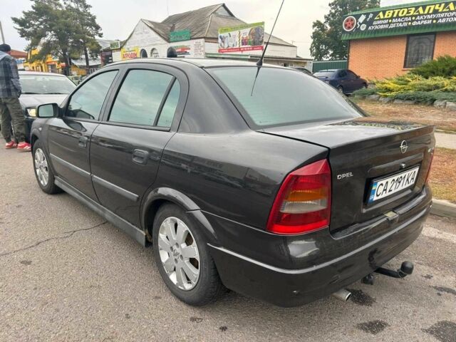 Черный Опель Астра, объемом двигателя 1.6 л и пробегом 290 тыс. км за 3000 $, фото 5 на Automoto.ua