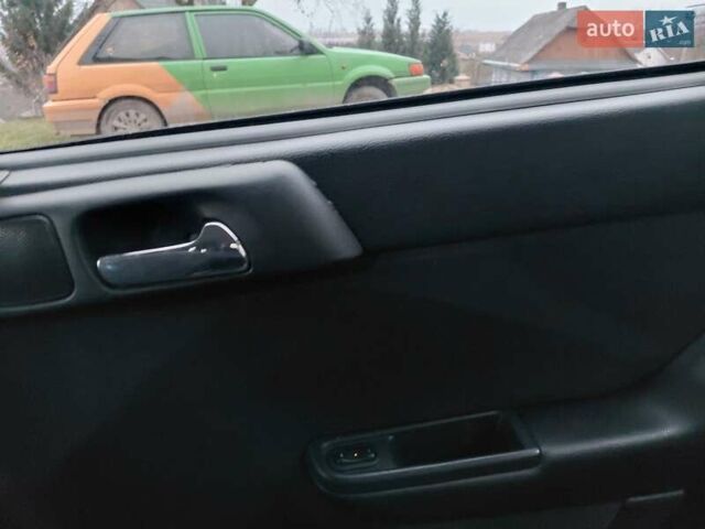 Черный Опель Астра, объемом двигателя 2 л и пробегом 350 тыс. км за 3199 $, фото 2 на Automoto.ua