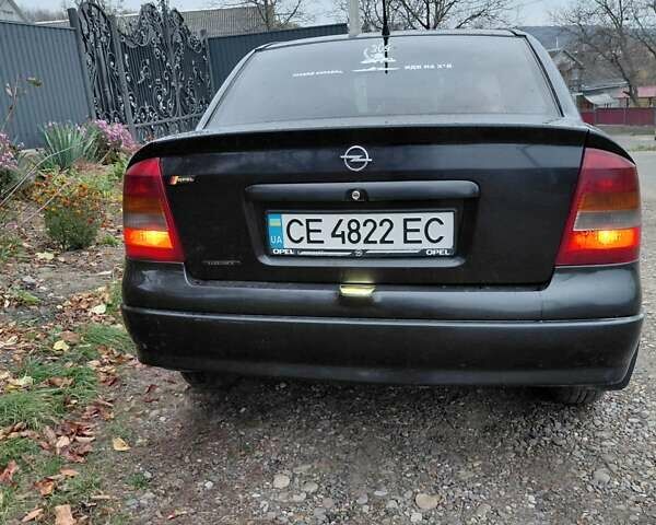 Черный Опель Астра, объемом двигателя 2 л и пробегом 350 тыс. км за 3199 $, фото 11 на Automoto.ua